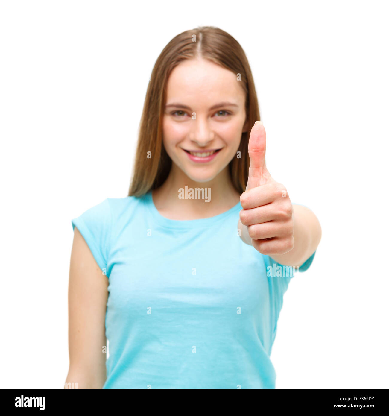 Portrait of a woman showing thumbs up sign and smiling isolated on ...