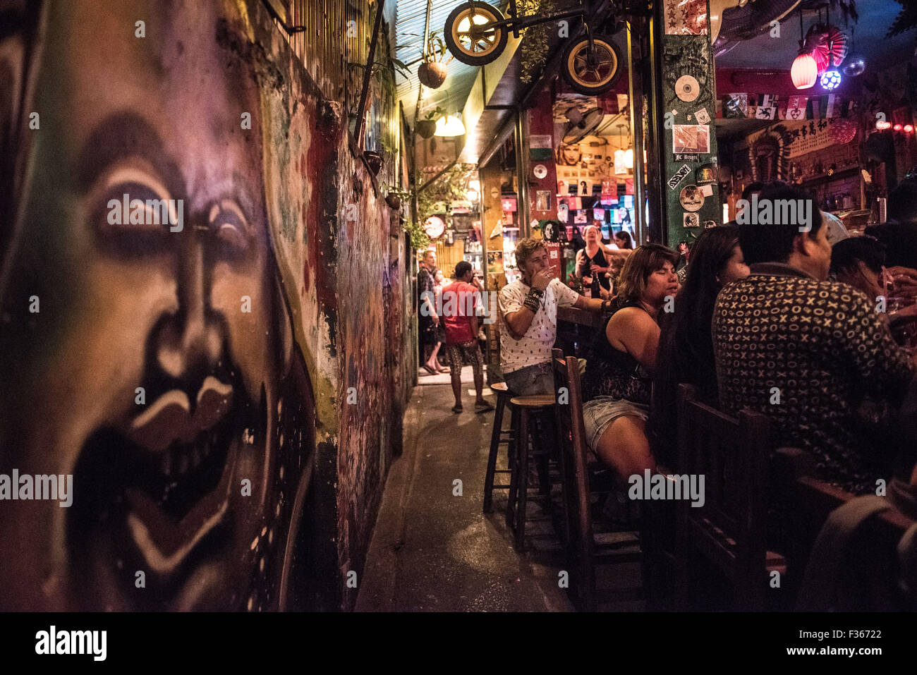 A backstreet bar with graffiti in Bangkok, Thailand. Stock Photo