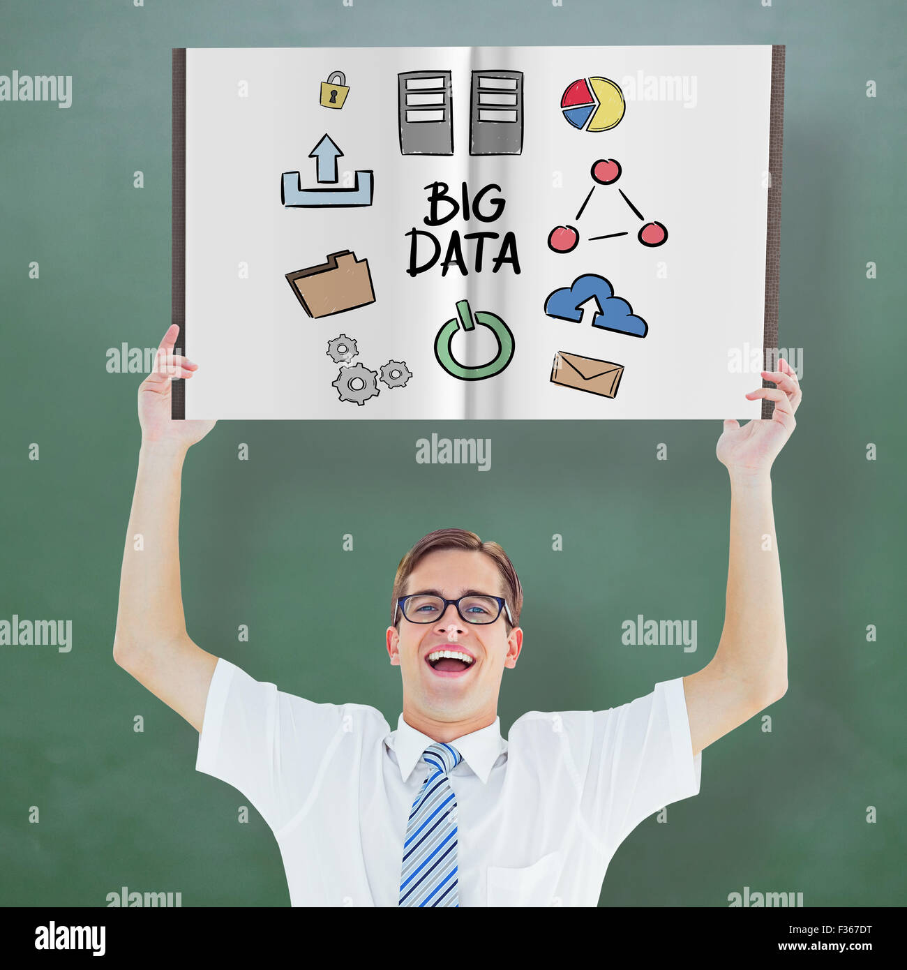 Composite image of nerd showing a book Stock Photo - Alamy