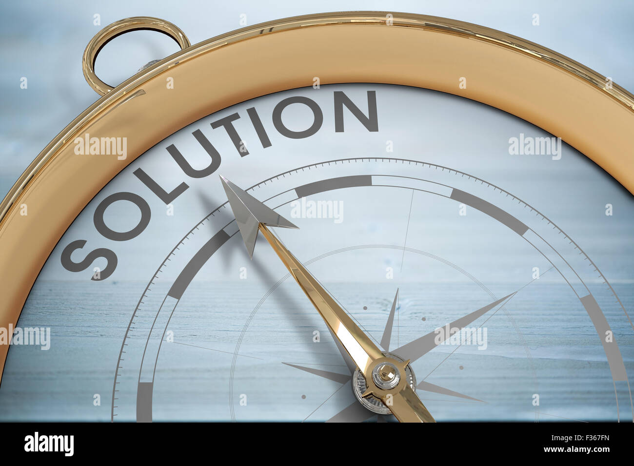 Composite image of compass pointing to solution Stock Photo - Alamy