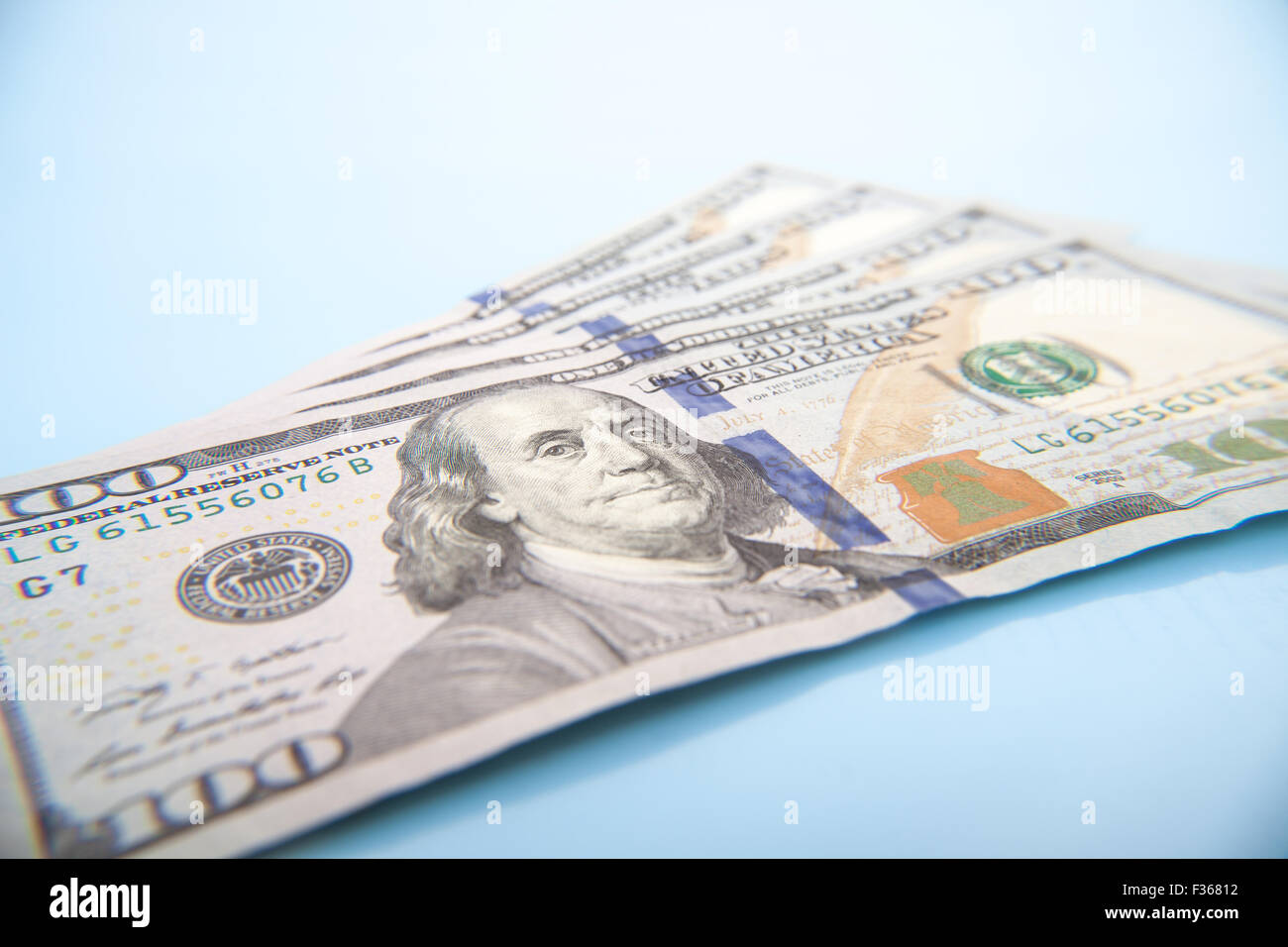 Four hundred dollar. All on blue background Stock Photo