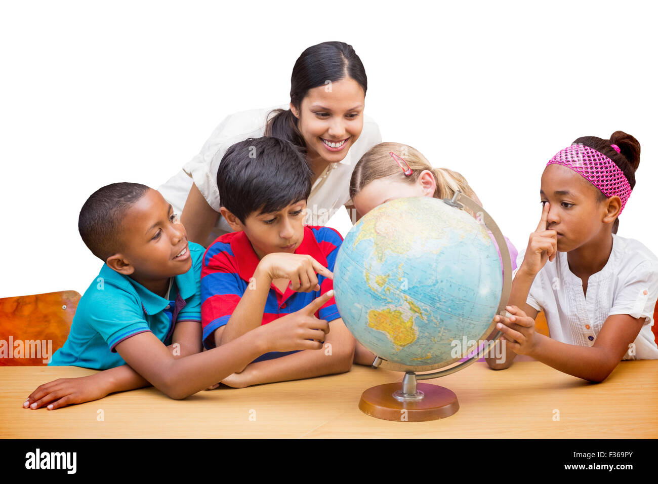 Composite image of cute pupils and teacher looking at globe in library ...