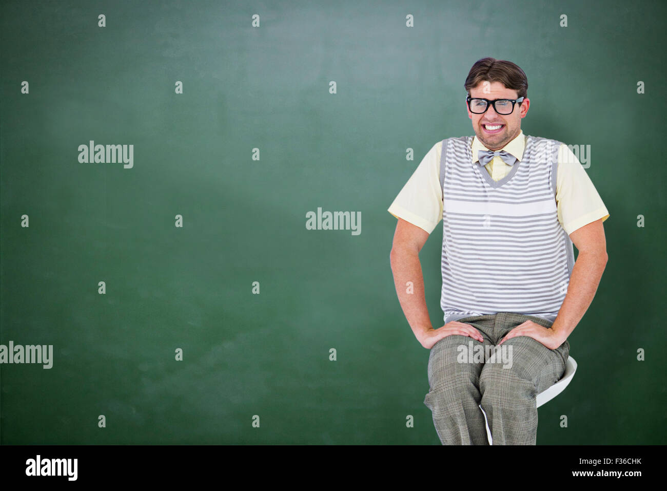 Sitting on stool hi-res stock photography and images - Alamy
