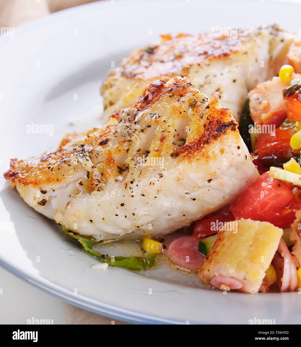 Seared Mahi Mahi Fillets with Vegetables and Sauce Stock Photo Alamy