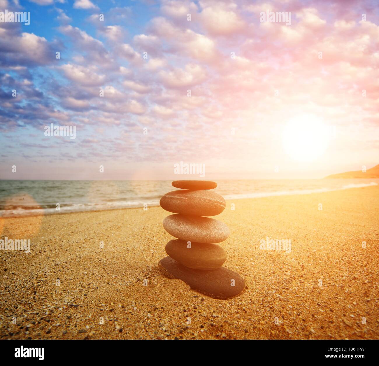 Stone tower on the beach Stock Photo - Alamy