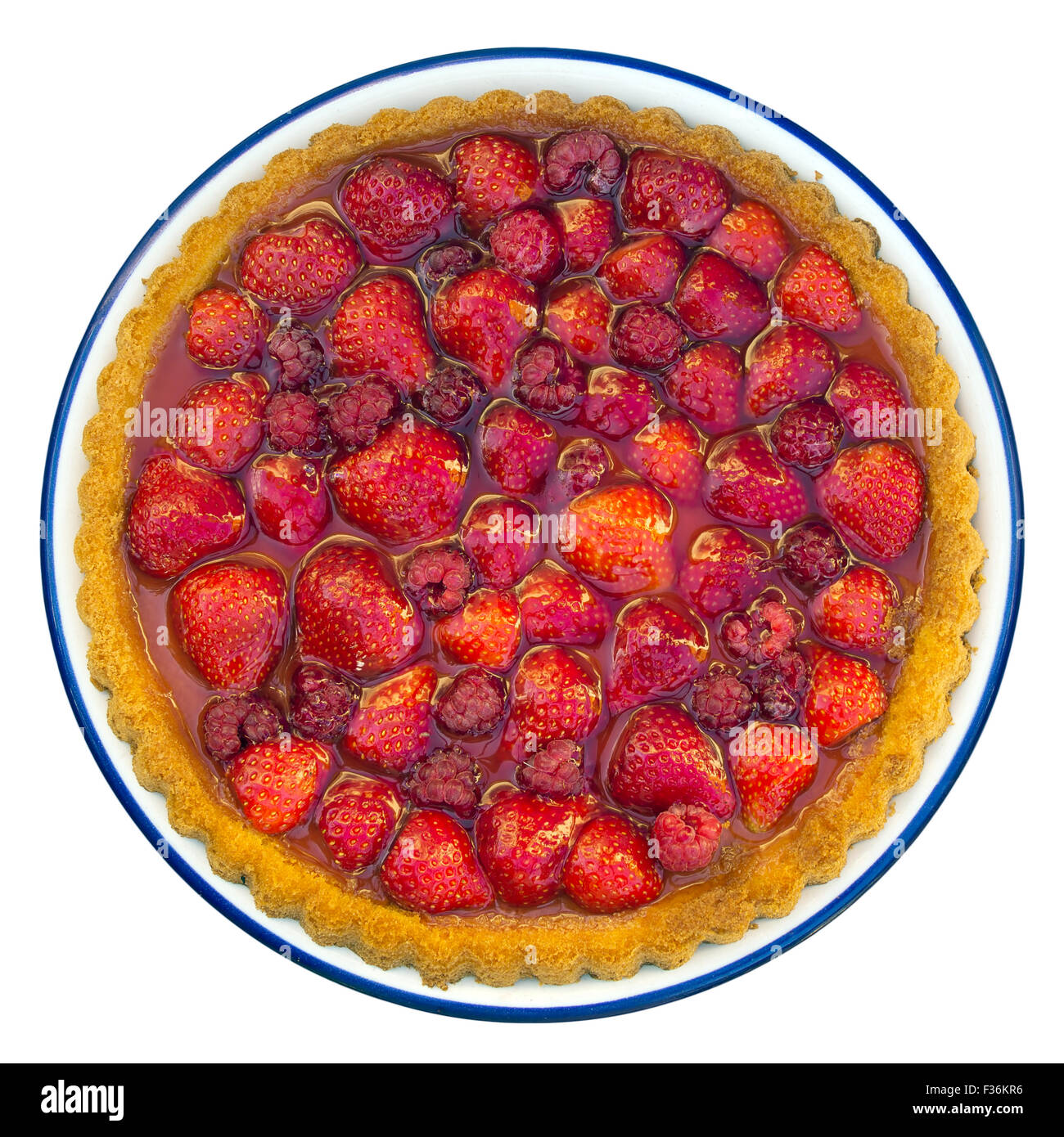 Traditional summer treat. Strawberry and raspberry flan, islated on white. Stock Photo