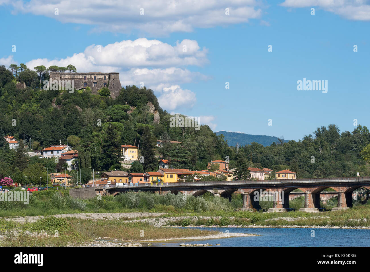 Aulla town in the Lunigiana area of north Tuscany, Italy. River Magra in the foreground and Brunella fortress on the hill. Stock Photo