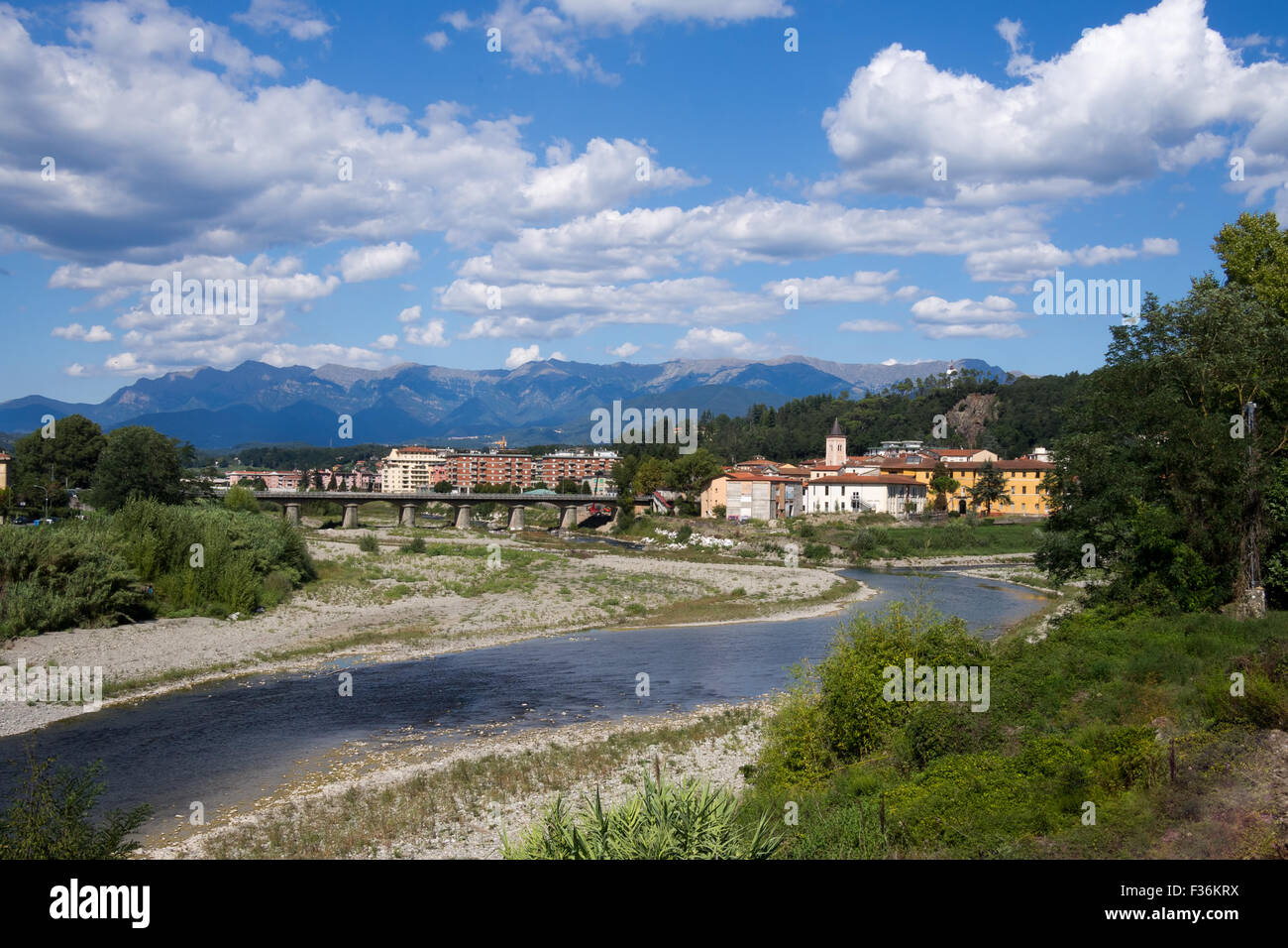 Aulla town with river Magra in the foreground and Apennine mountains behind. Lunigiana, north Tuscany, Italy. Stock Photo