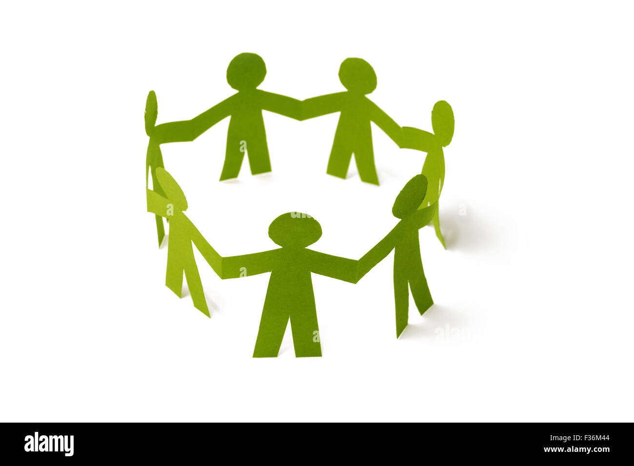 Group of paper doll holding hands Stock Photo Alamy