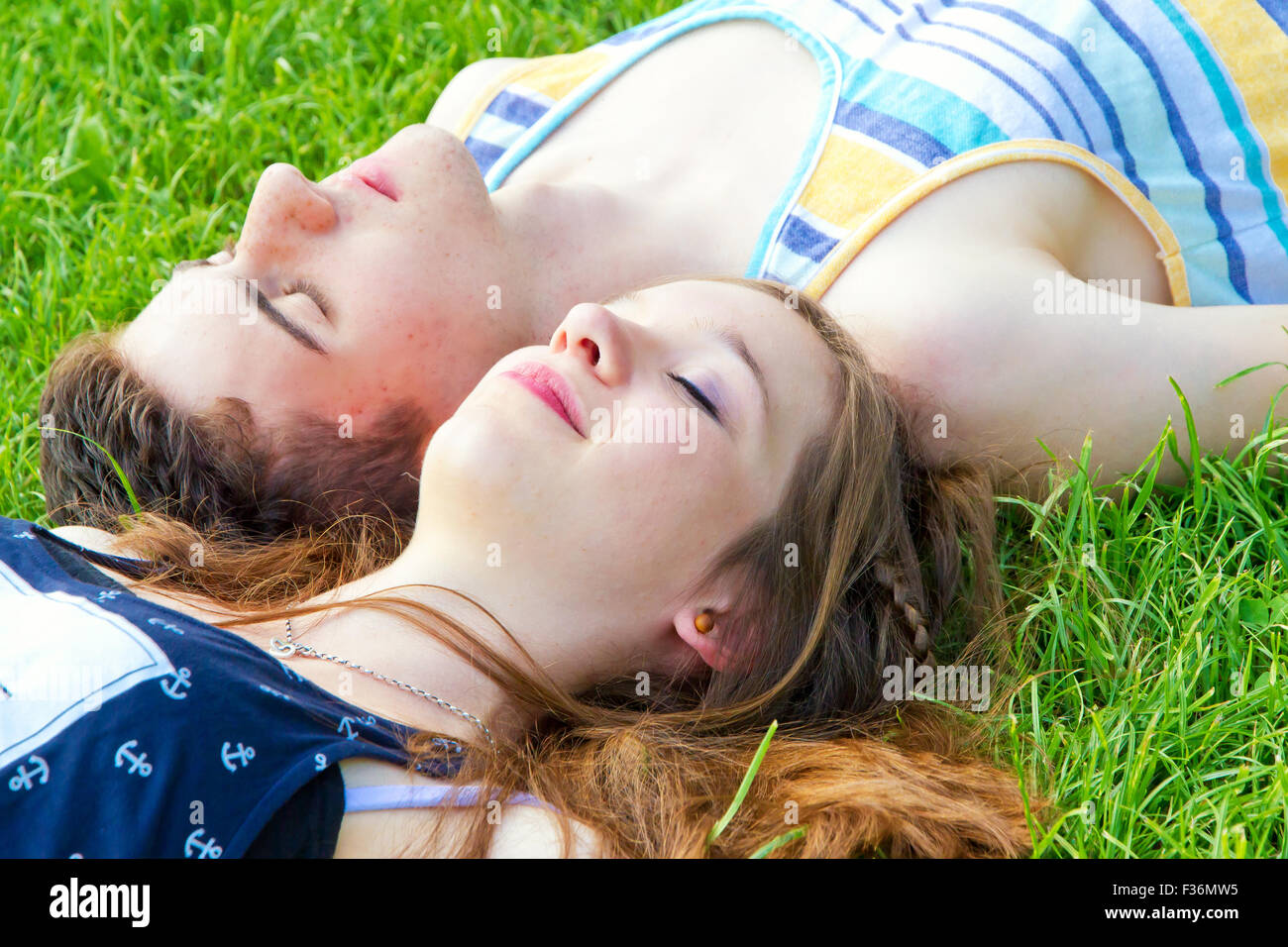Happy, young couple on a meadow Stock Photo