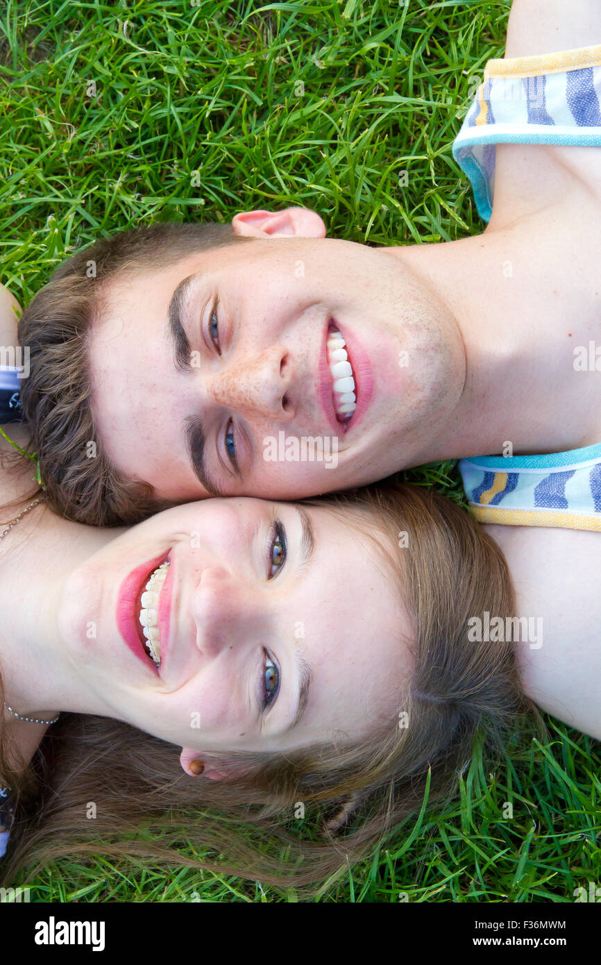 Happy, young couple on a meadow Stock Photo