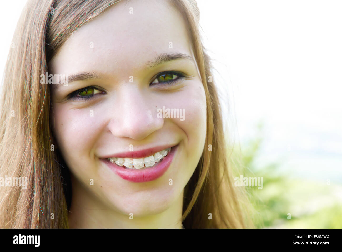 Portrait of a happy teenager with braces Stock Photo