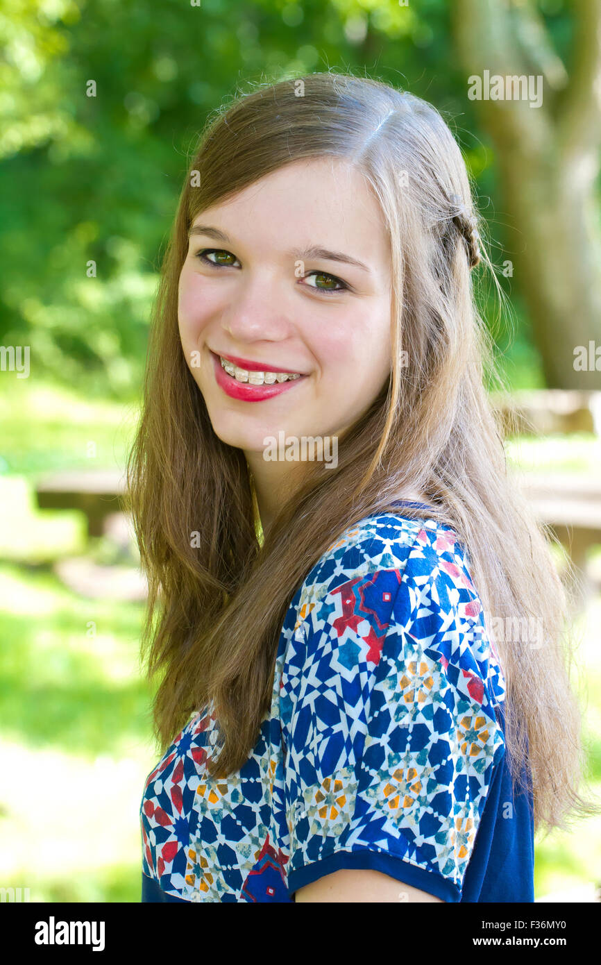 Portrait of a happy teenager with braces Stock Photo