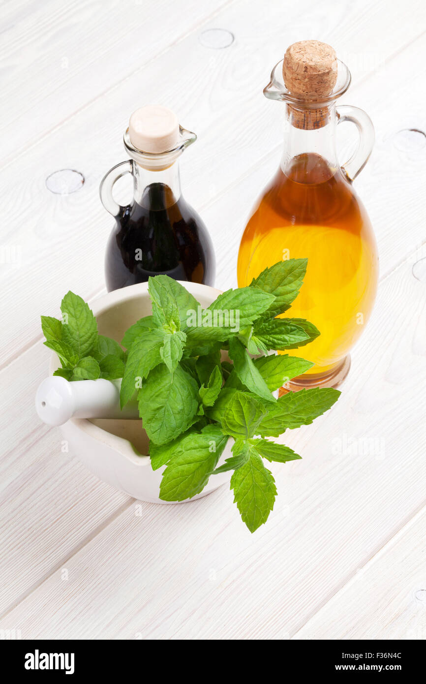 Fresh herbs and spices on wooden table Stock Photo