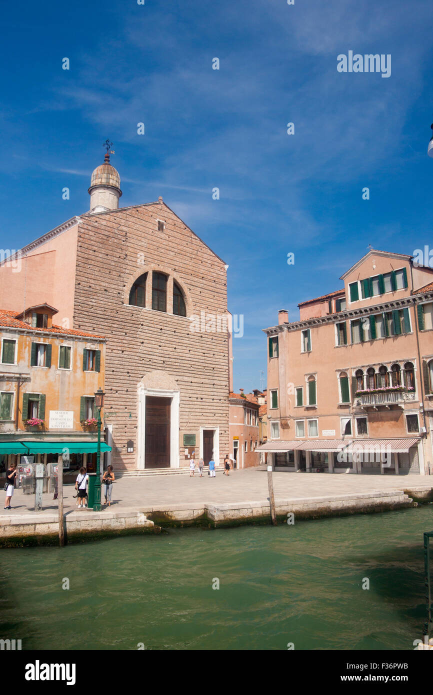 Chiesa di Church of San Pantalon and campo square outside with canal in foreground Dorsoduro Venice Veneto Italy Stock Photo