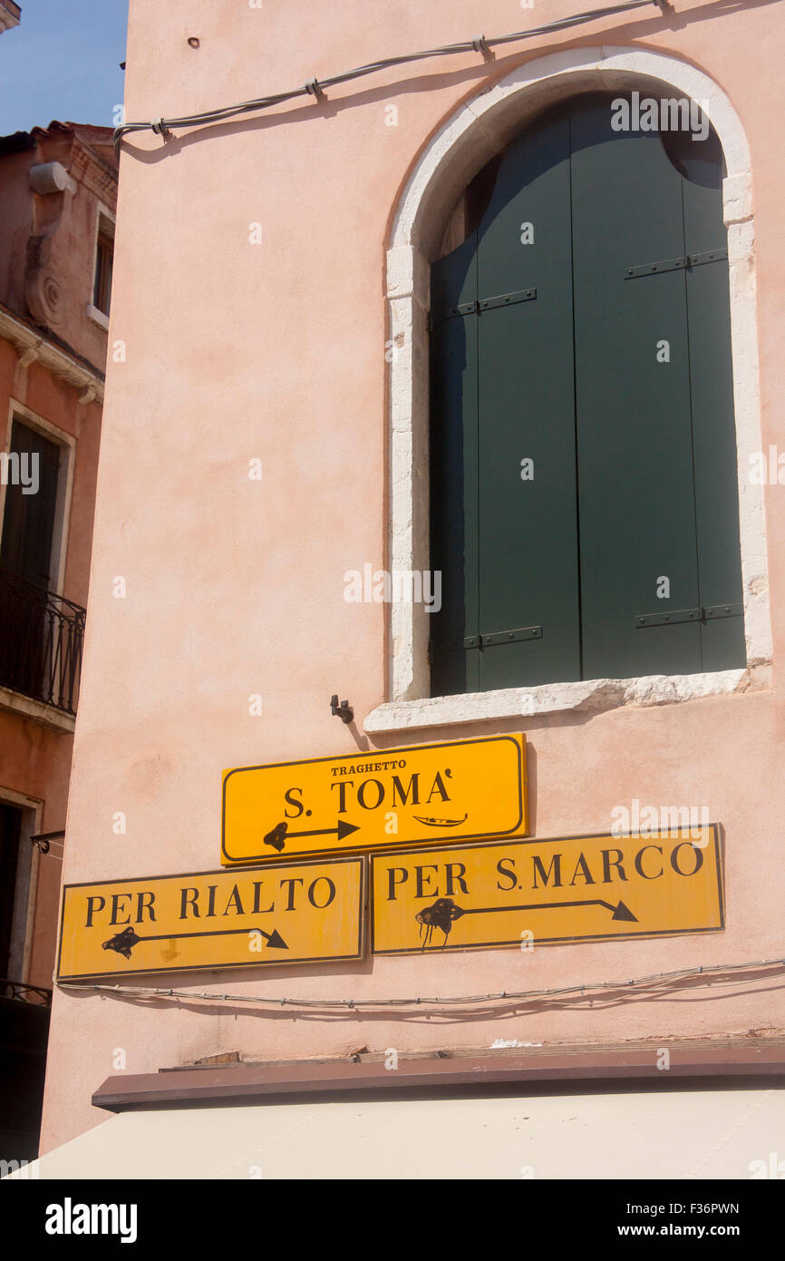 Street signs directions to Rialto, San Marco and vaporetto stop Venice Veneto Italy Stock Photo