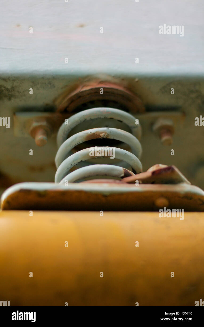 old metal shock spring rust paint Stock Photo Alamy