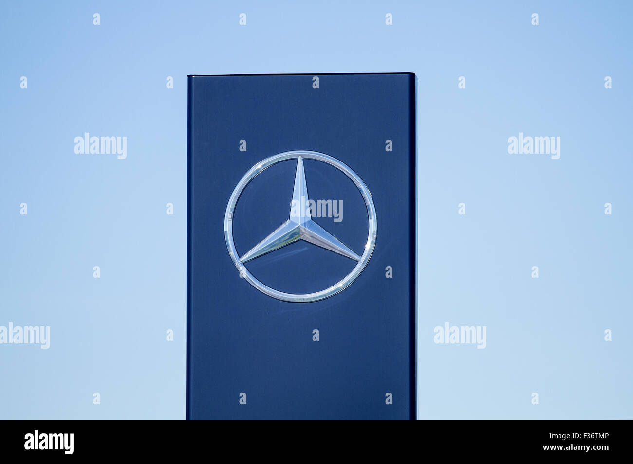 Star shape logo of the make of German car Mercedes-Benz motorcar Daimler AG Group at the Mercedes showroom in Dundee, UK. Stock Photo