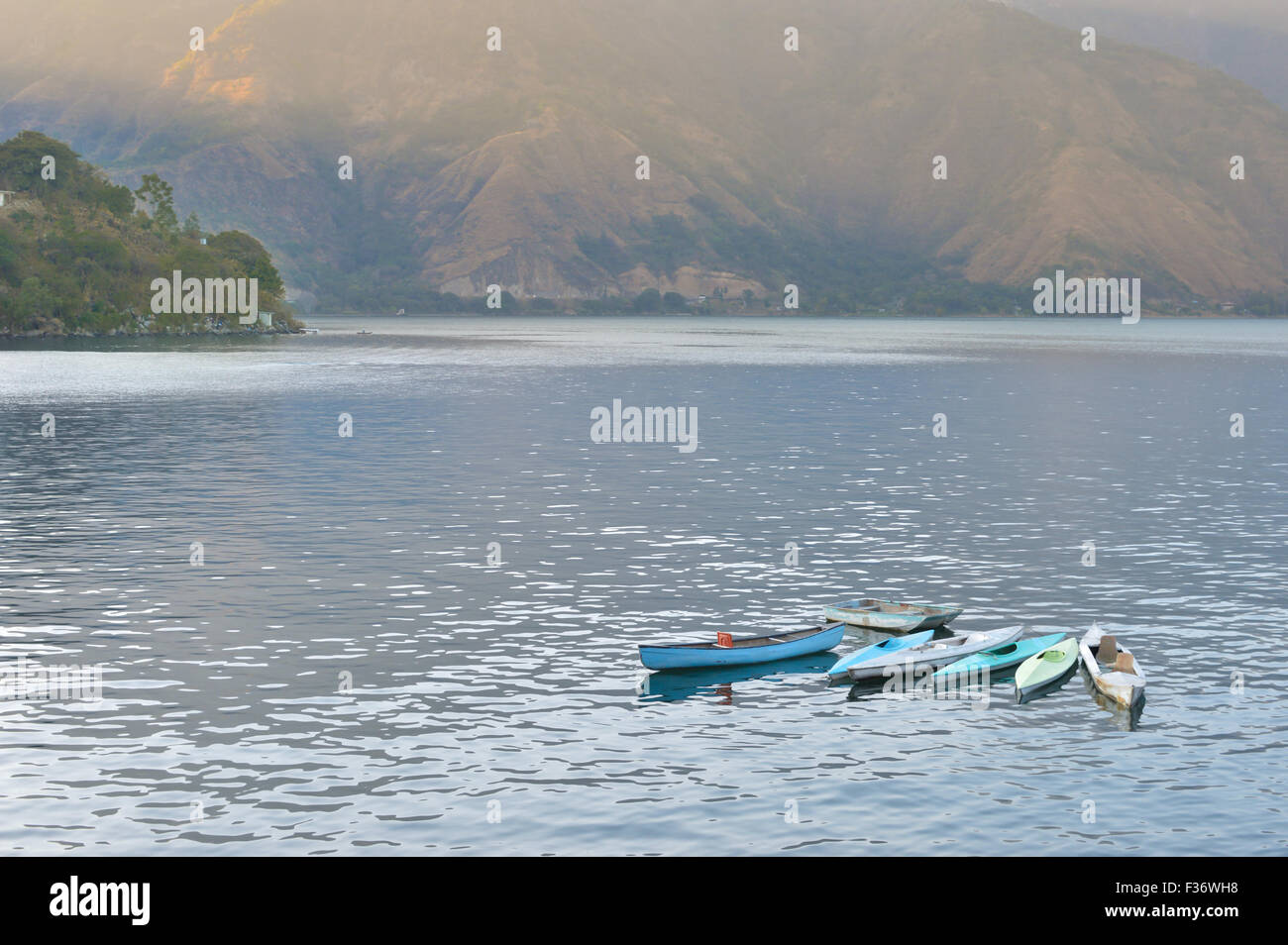 Colorful kayaks seen in the lake Atitlan in Guatemala Stock Photo
