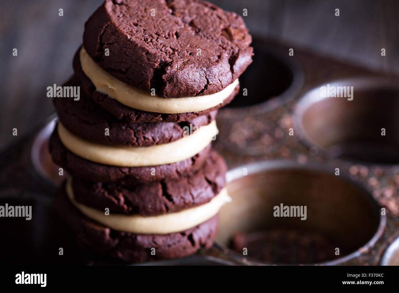 Chocolate brownie cookies with peanut butter filling Stock Photo Alamy