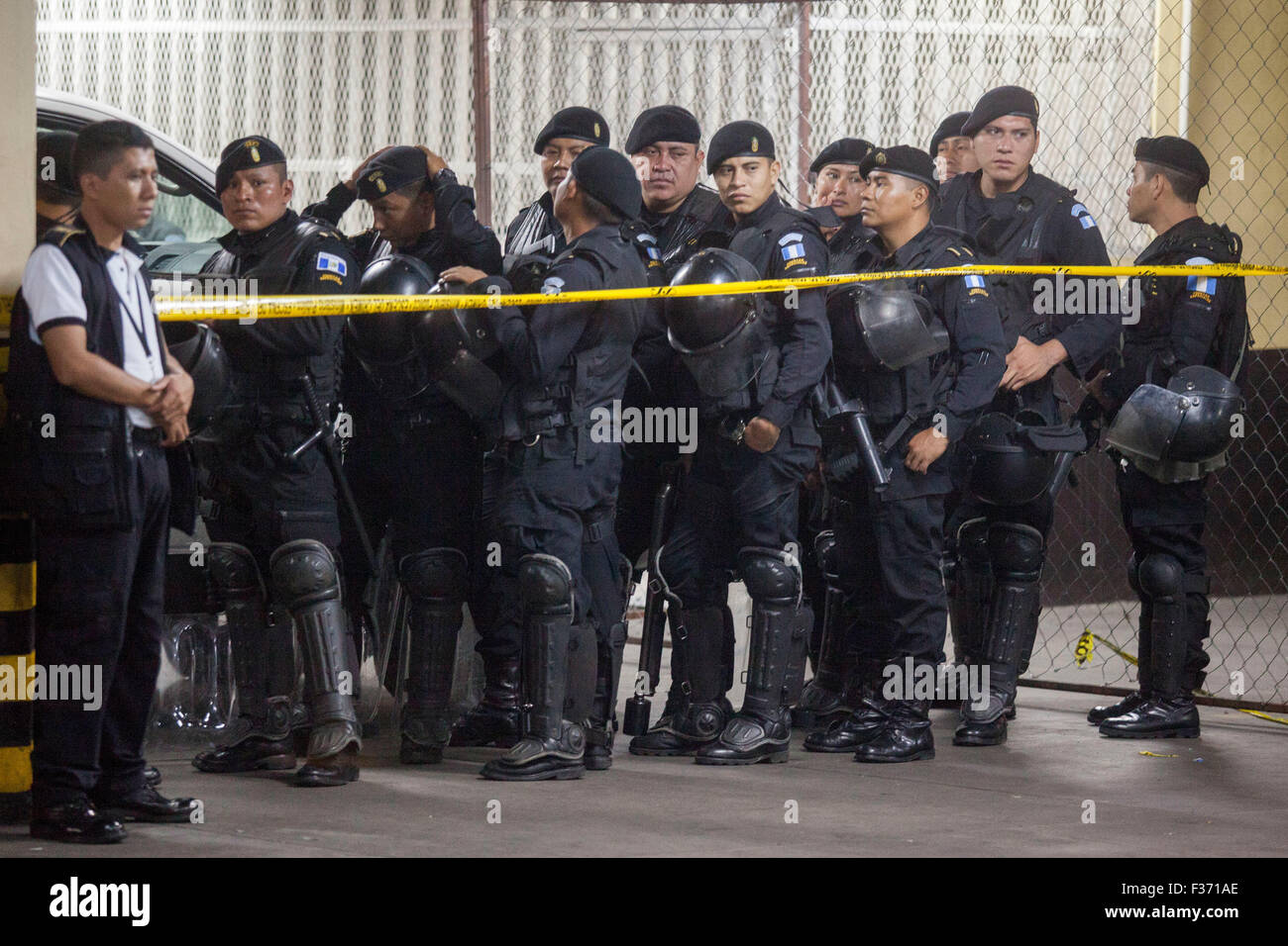 Guatemala City, Guatemala. 30th Sep, 2015. National Civil Police Special Forces agents stand guard in the Tower of Courts, in Guatemala City, capital of Guatemala, Sept. 30, 2015. A gang member was killed and two others wounded by rival gangsters of Barrio 18 and Mara Salvatrucha while they were held under custody in the Tower of Courts basement, located in the Civic Center of the Guatemalan capital, according to local press information. Credit:  Luis Echeverria/Xinhua/Alamy Live News Stock Photo