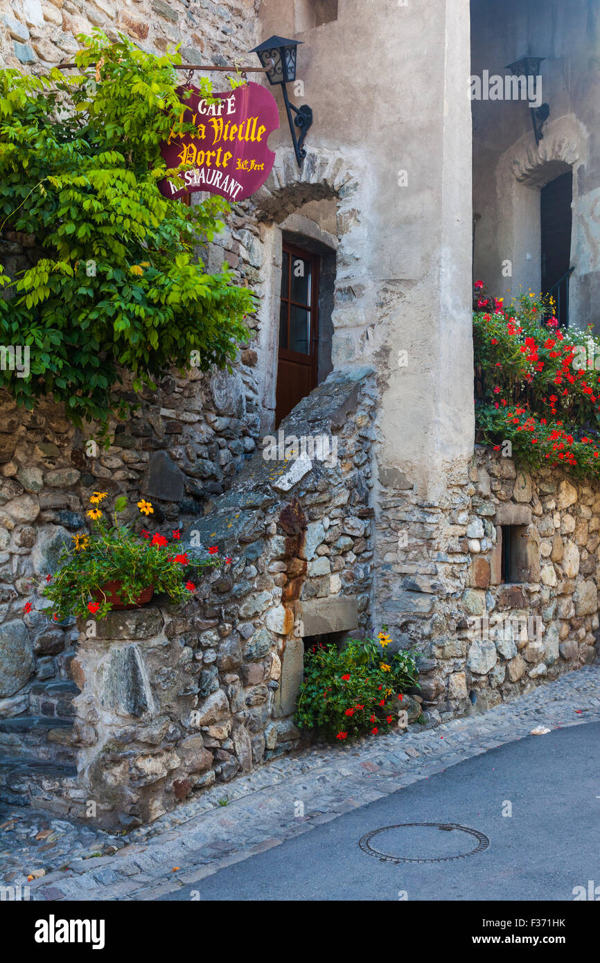 Entrance to a restaurant by the main entry gate into the village of Yvoire, France Stock Photo