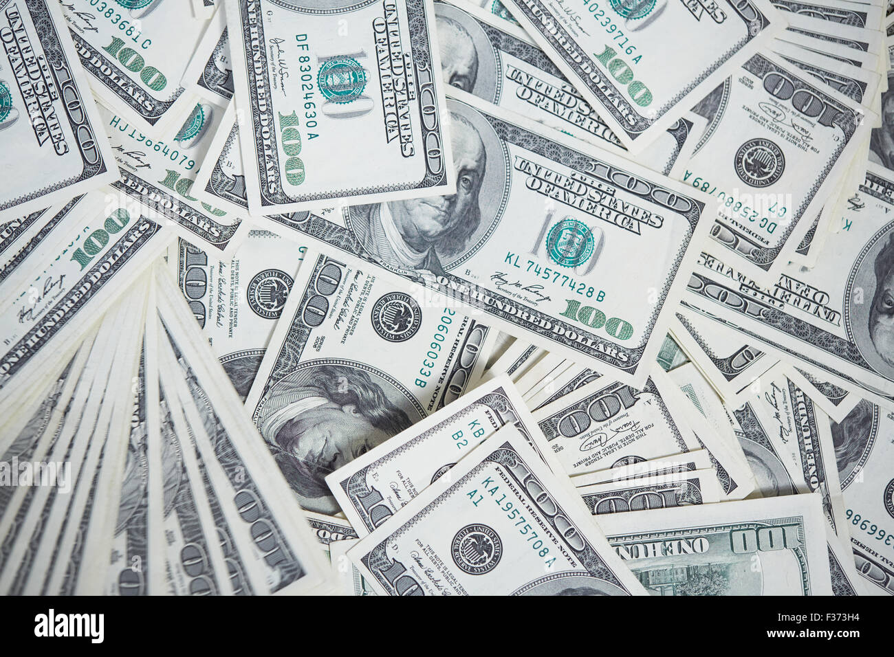 money in a chaotic manner on the floor Stock Photo