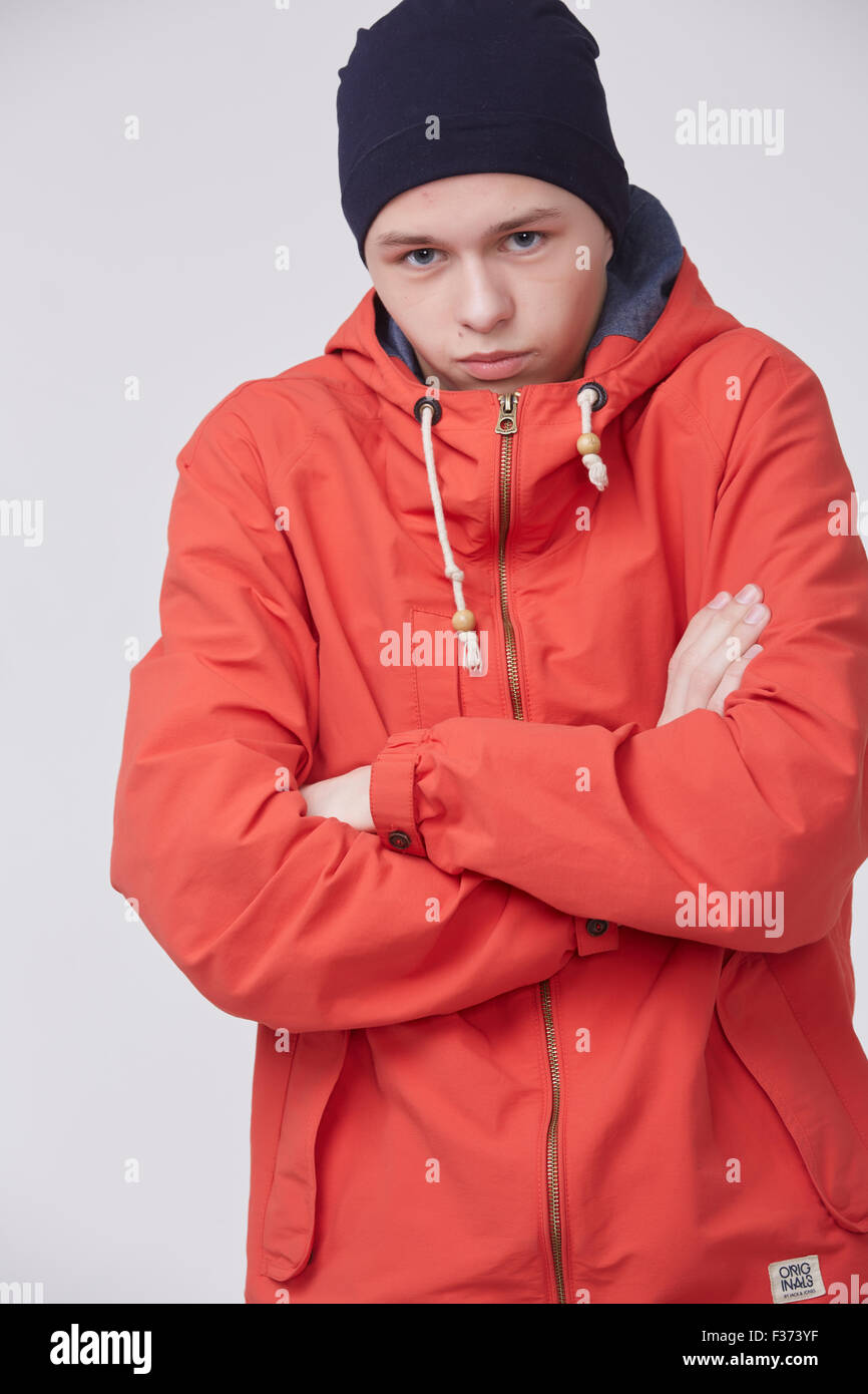 young guy in a sports jacket and hat Stock Photo Alamy