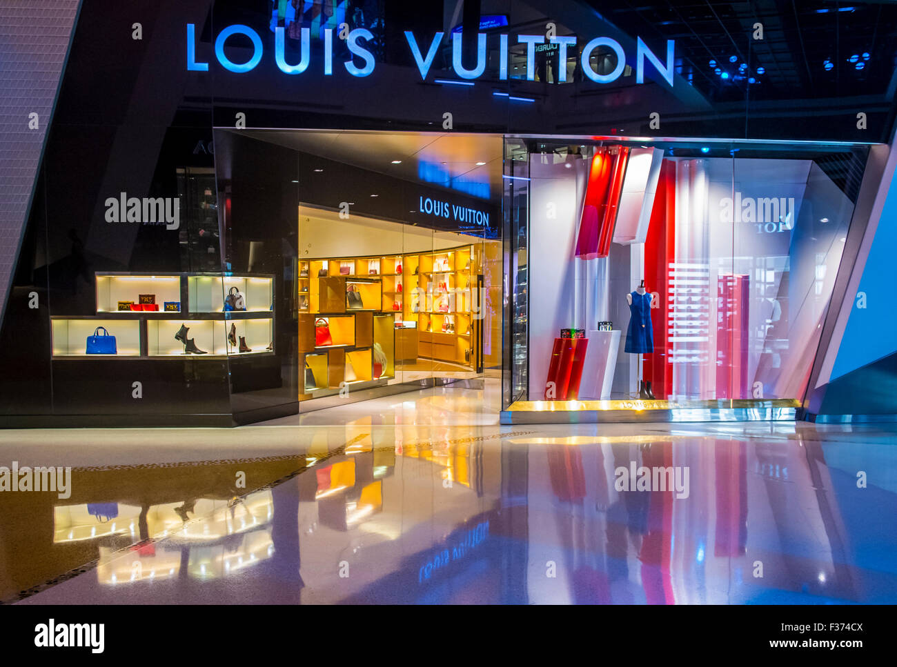 Logos of the luxury goods brand Louis Vuitton on a heap on a table. Copy  space. Web banner format Stock Photo - Alamy