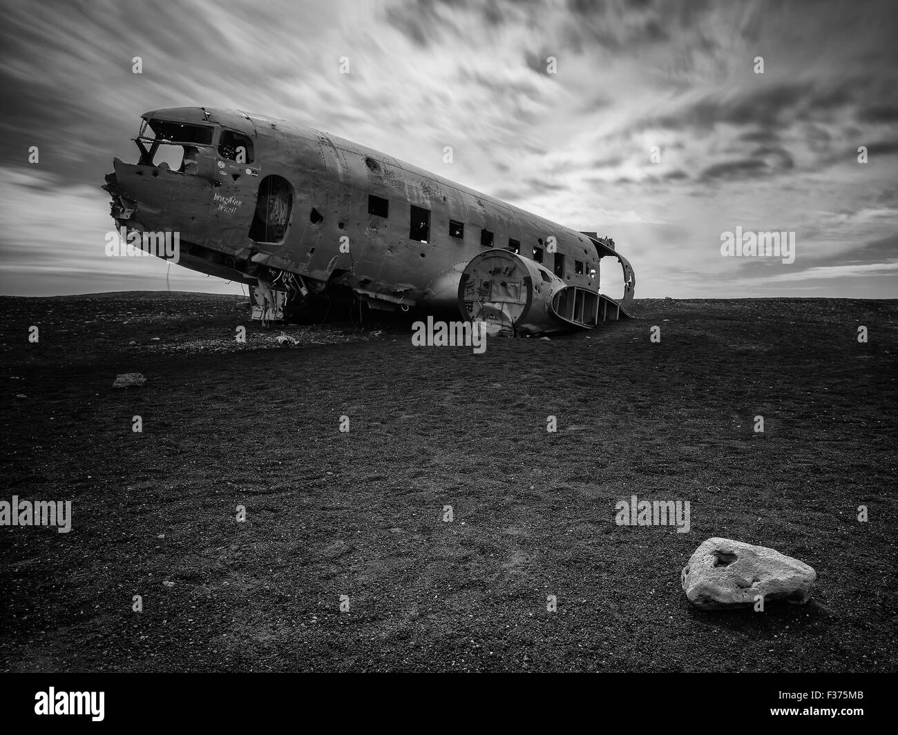Abandoned plane in a deserted black sand beach in Iceland. Stock Photo