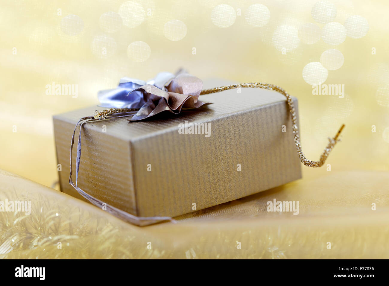 Christmas gift box on yellow background Stock Photo