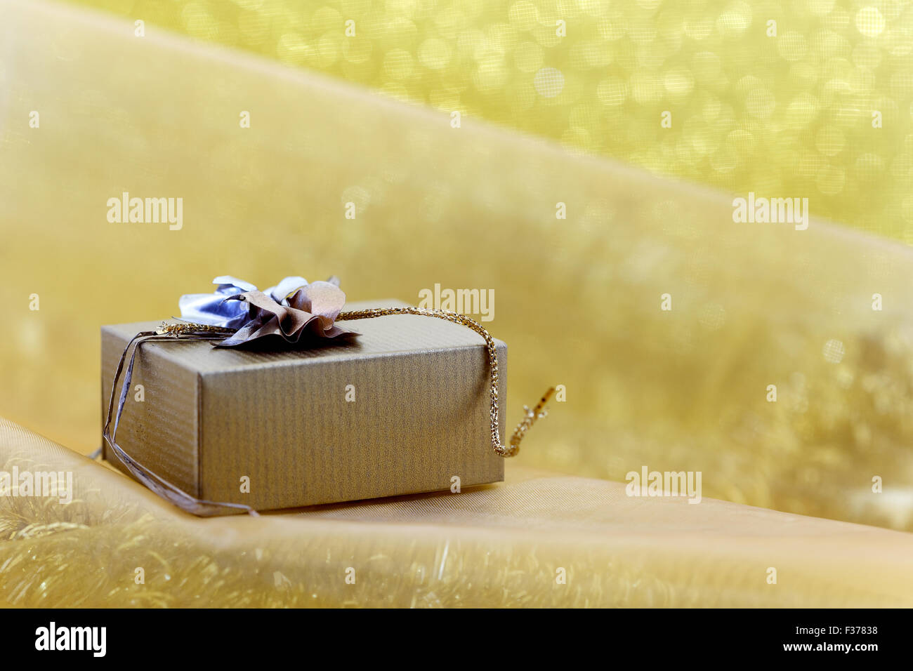 Christmas gift box on yellow background Stock Photo