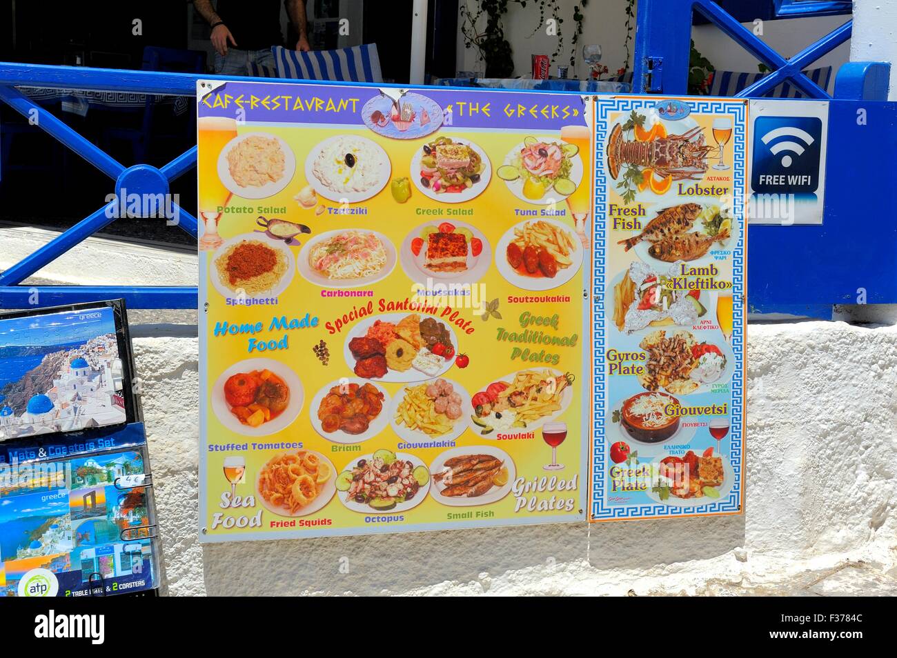 Greek restaurant menu board Fira Santorini Greece Stock Photo