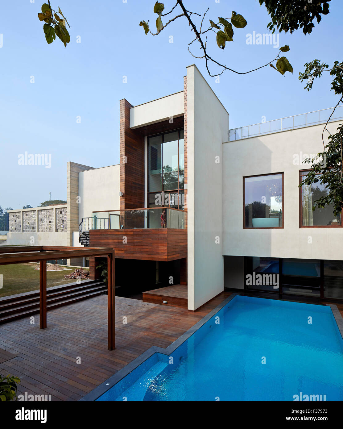 Overall exterior view around pool. House 4, New Delhi, Delhi, India