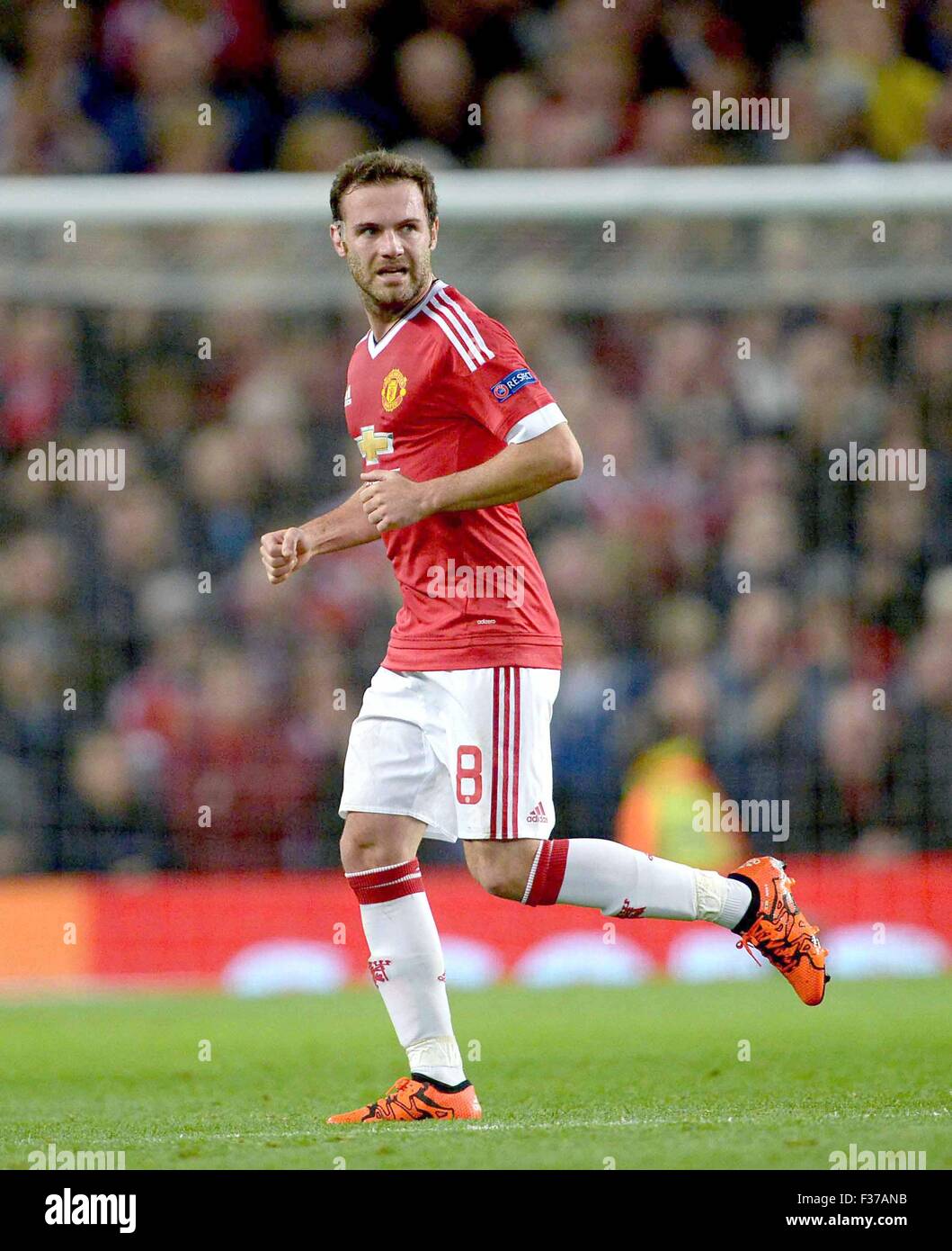 Manchester, Great Britain. 30th Sep, 2015. Manchester United's Juan Manuel Mata celebrates his 1-1 equaliser during the UEFA Champions League Group B first leg soccer match between Manchester United and VfL Wolfsburg at the Old Trafford in Manchester, Great Britain, 30 September 2015. Photo: Peter Steffen/dpa/Alamy Live News Stock Photo