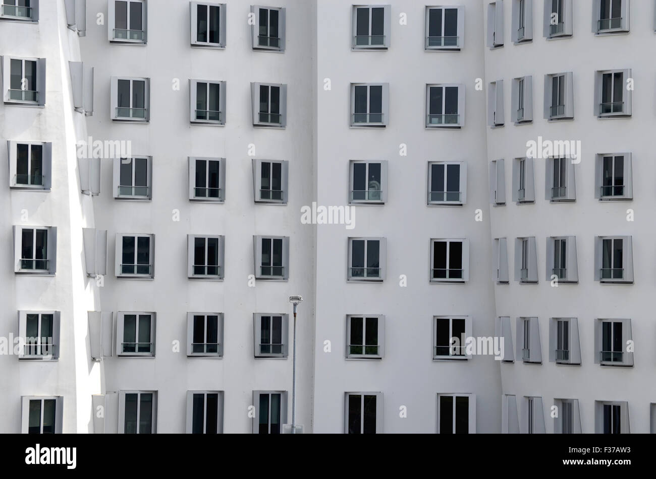 High-rise building facade, windows, Gehry buildings in the MedienHafen, Düsseldorf, North Rhine-Westphalia, Germany Stock Photo