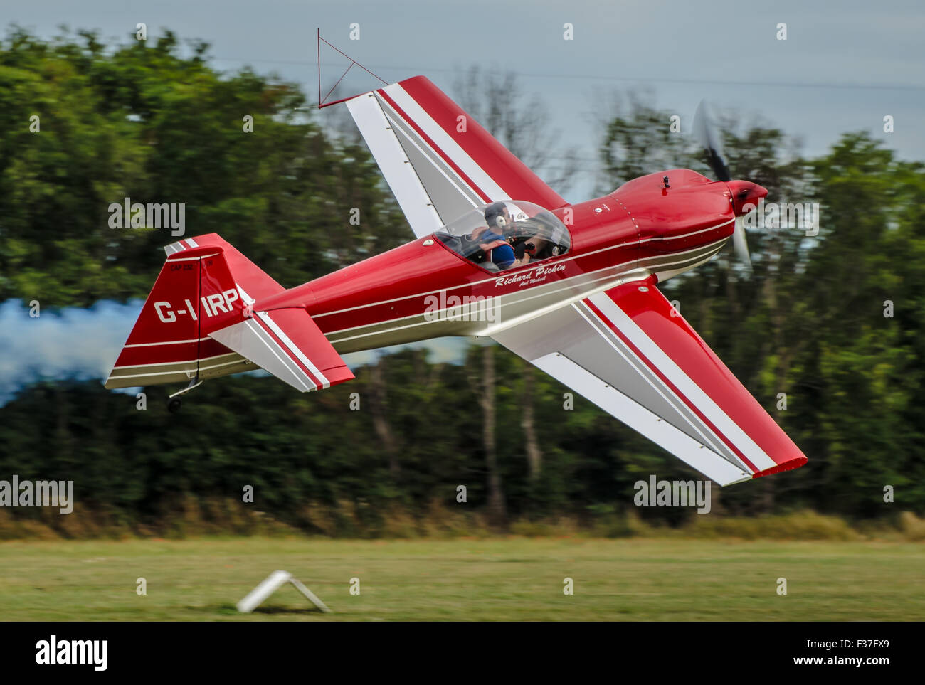 Michael Pickin carrying out a display take off prior to an aerobatic display in his CAP 232 G-IIRP at Damyns Hall, Essex, UK Stock Photo