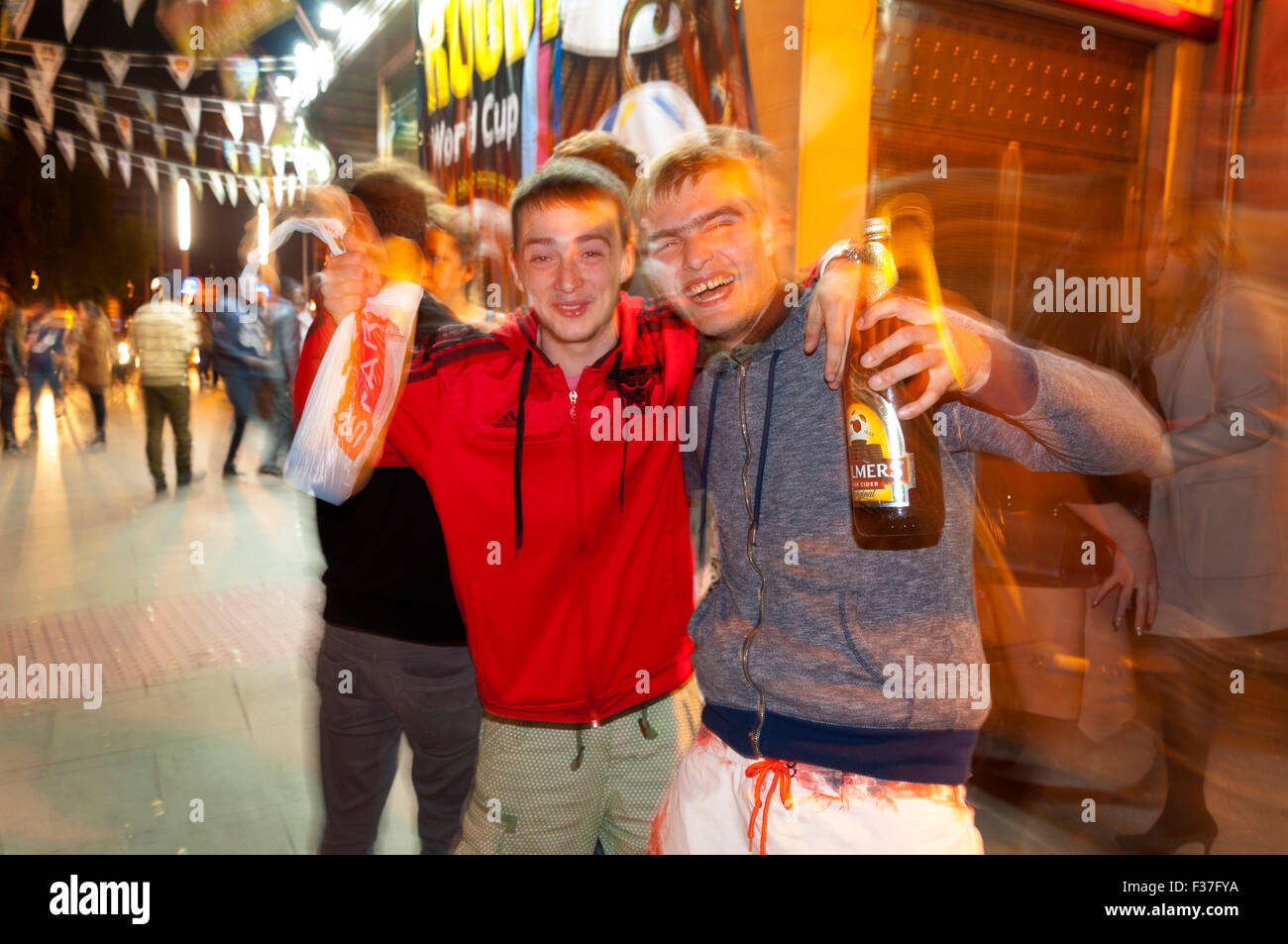 Young men under the influence of alcohol in Dublin, Ireland Stock Photo