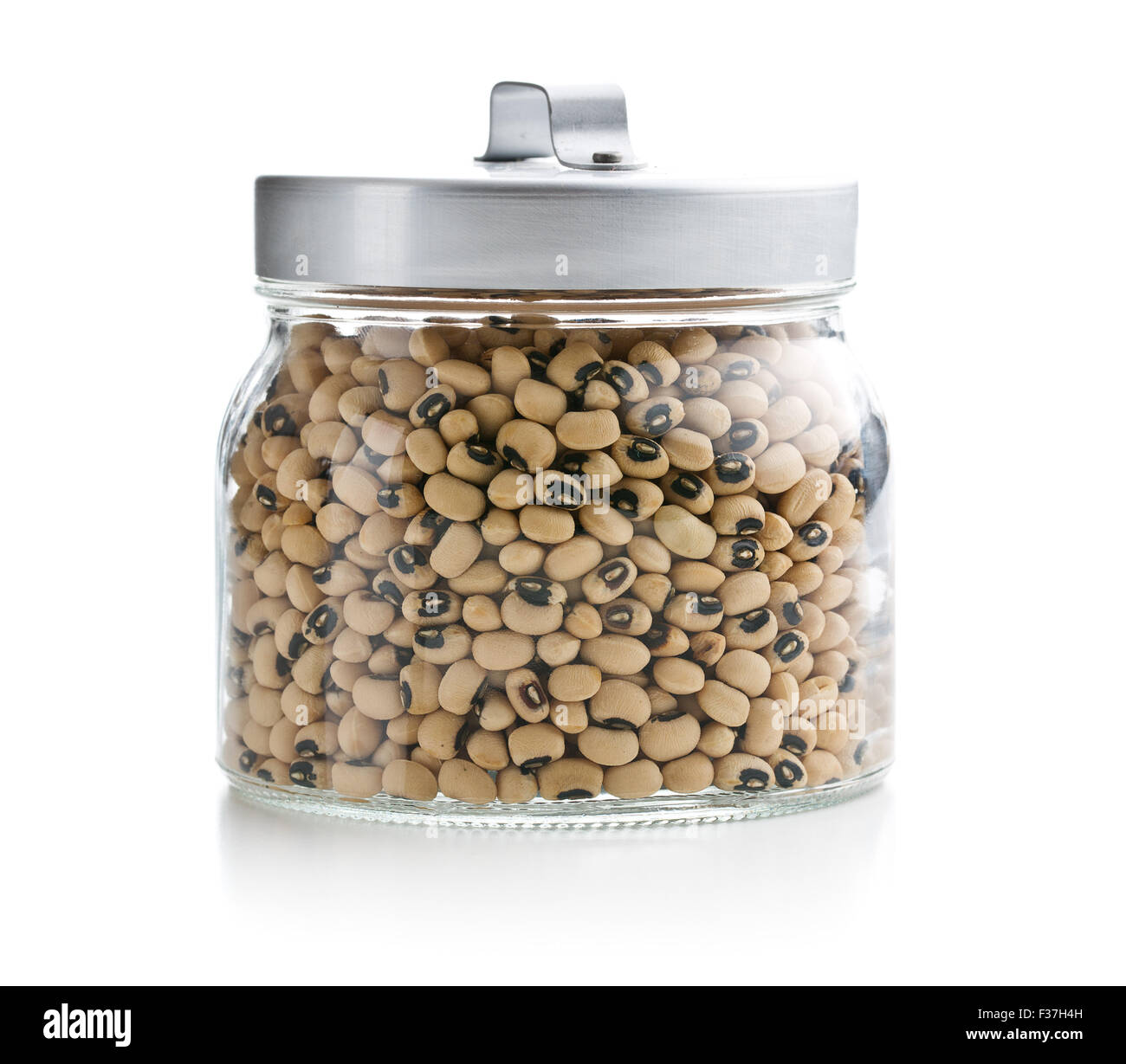 uncooked beans in jar on white background Stock Photo