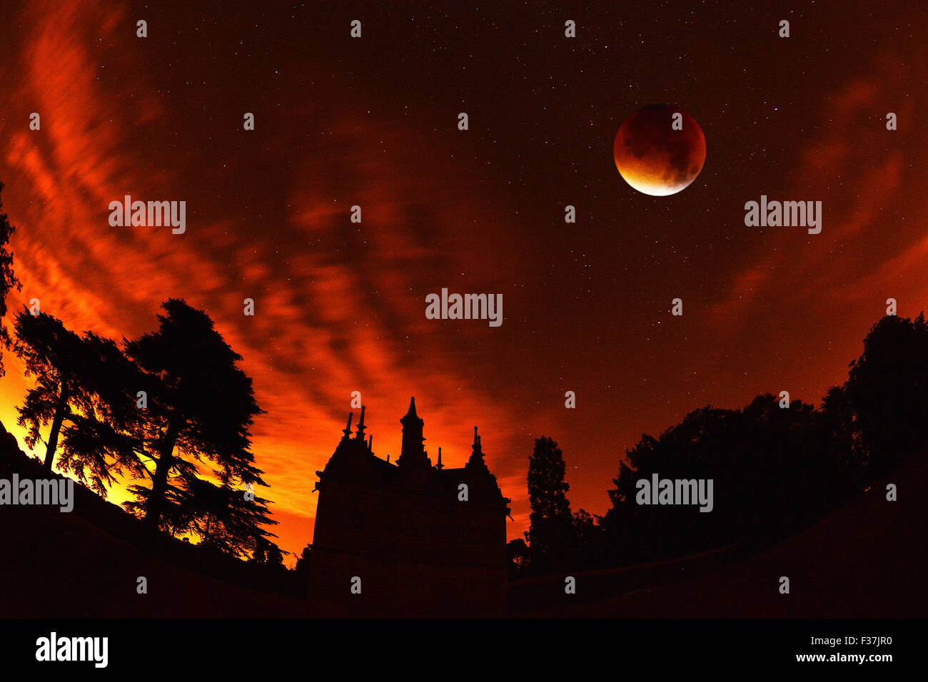 COMPOSITE PHOTO of the bloodmoon over Rushton Triangular Lodge, Northamptonshire, 28th September, 2015. Photo by John Robertson. Stock Photo