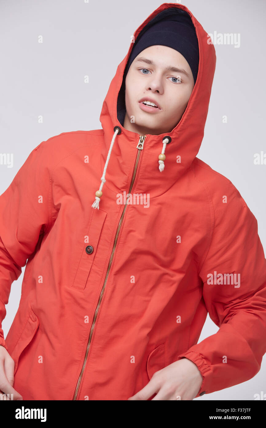 young guy in a sports jacket and hat Stock Photo Alamy