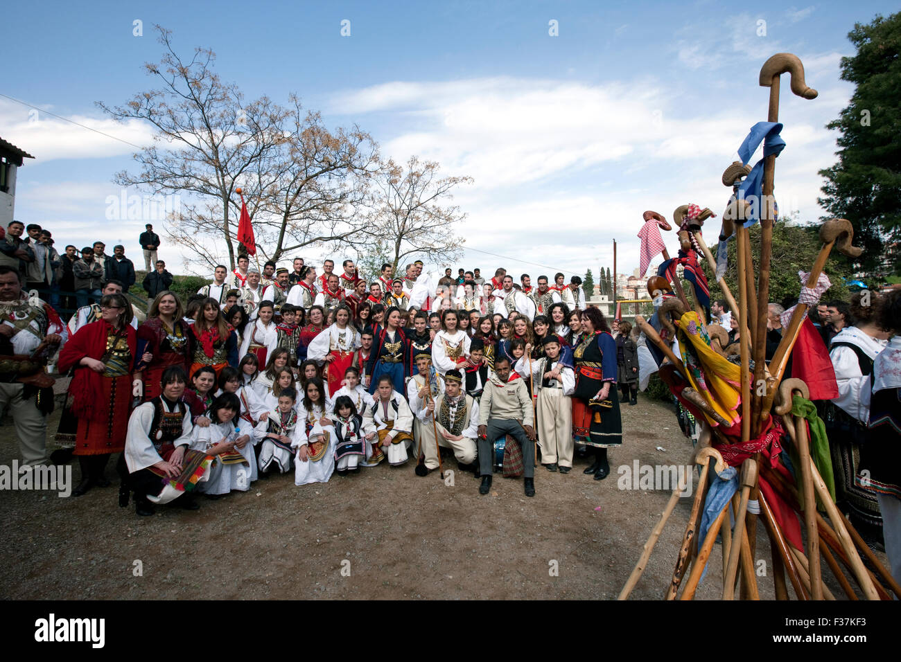 Group photo of Vlach Wedding performers of LAIOS cultural club union of Thebes and organ players with shepherd crooks at the end of annual ritual. GR Stock Photo