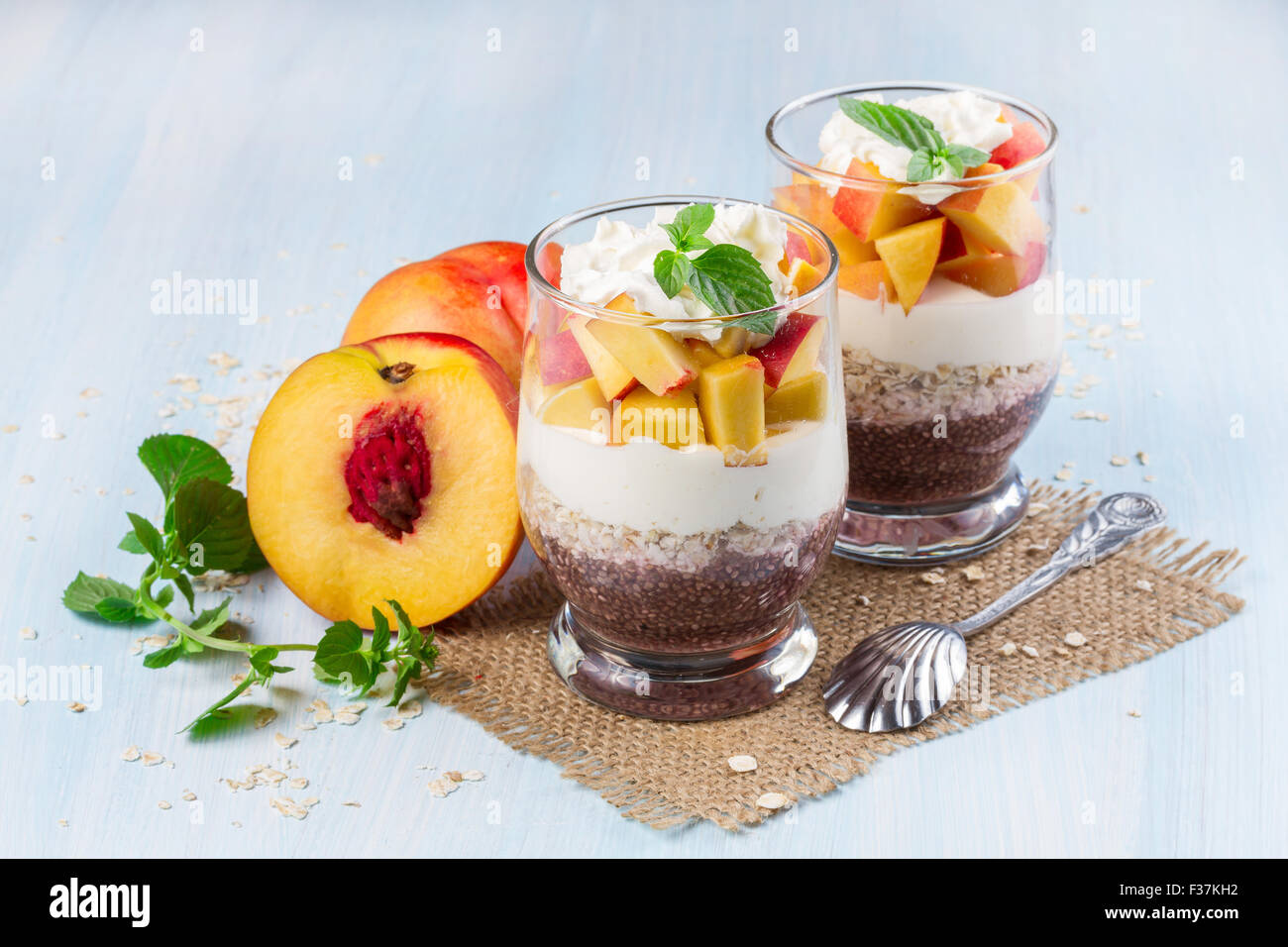 Chia seeds with oat flakes and peaches. Horizontal image. Stock Photo