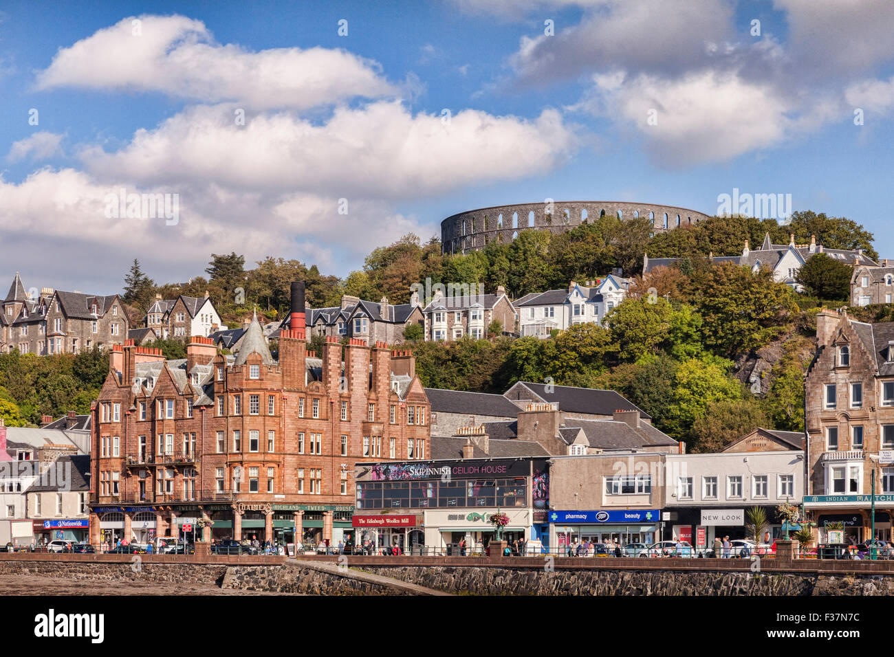 The promenade and McCaig's Tower at Oban, Argyll and Bute, Scotland, UK
