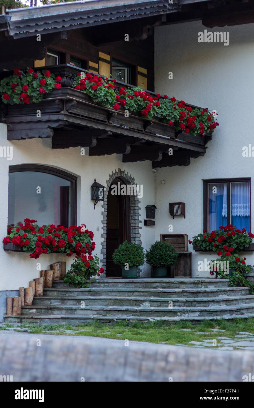 Village with beautiful houses, flowers, small details, animals in springtime, Austria, Filzmoos Stock Photo