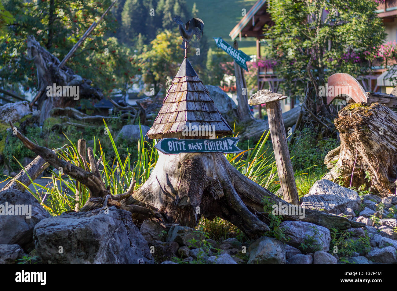 Village with beautiful houses, flowers, small details, animals in springtime, Austria, Filzmoos Stock Photo