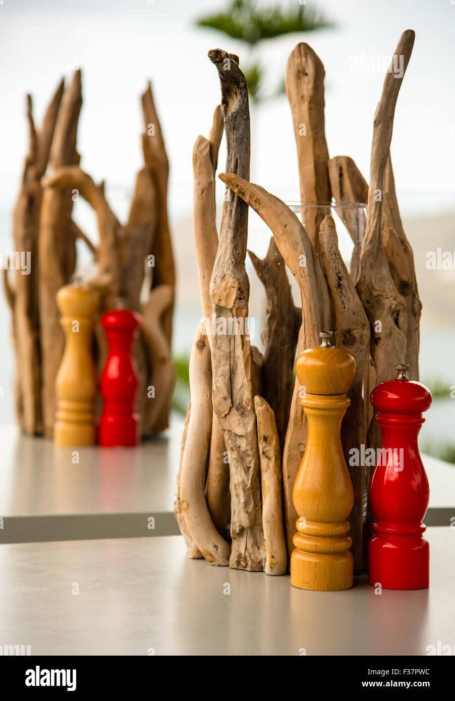 wooden salt and pepper mills on a dinner table Stock Photo Alamy