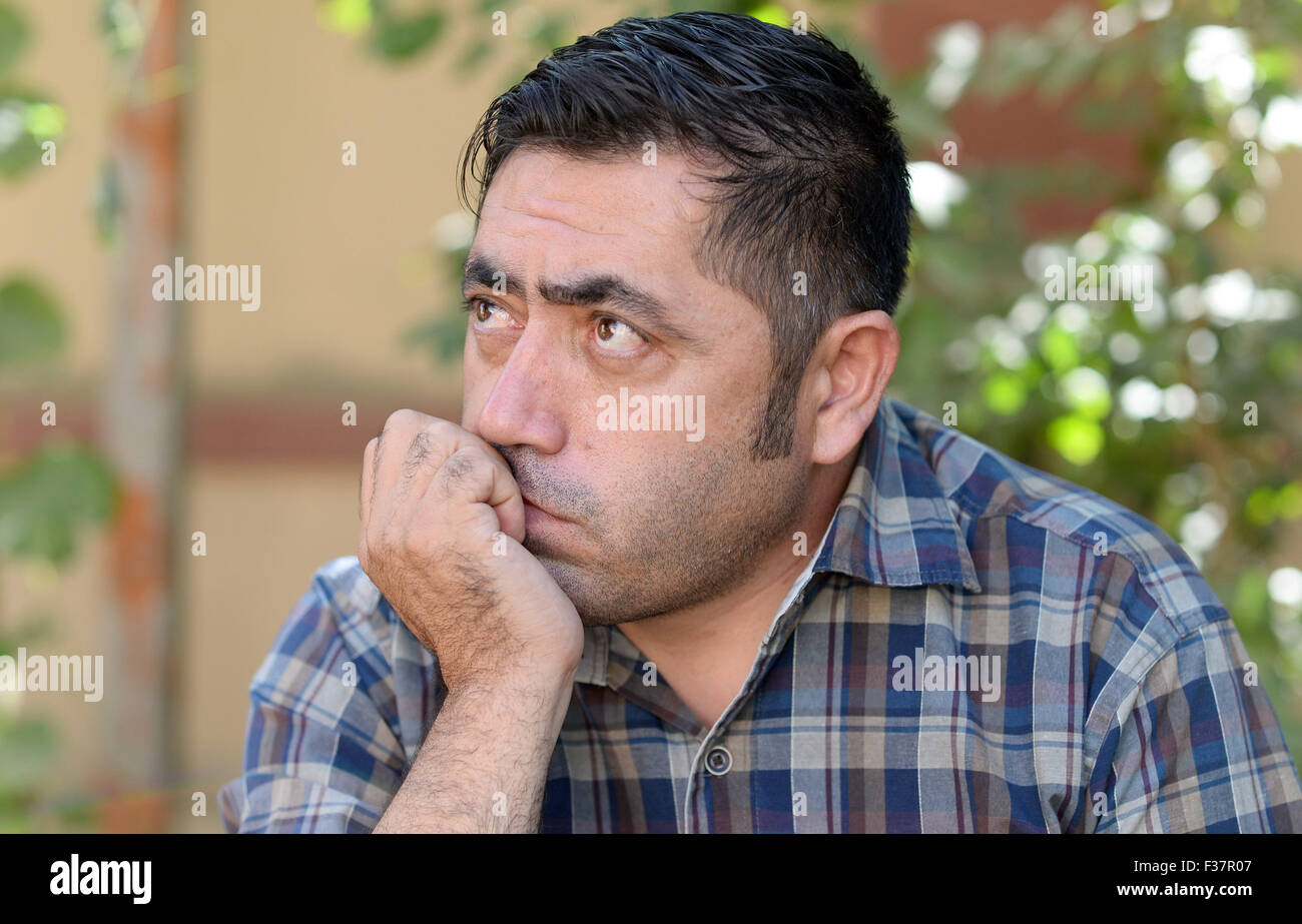Kabul, Afghanistan. 26th Sep, 2015. Yasin Adel, former translator for the German armed forces Bundeswehr, explains his situation in Kabul, Afghanistan, 26 September 2015. Adel used to work as a translator for the German armed forces until autumn 2006. His application for asylum was rejected by German authorities. Photo: Subel Bhandari/dpa/Alamy Live News Stock Photo