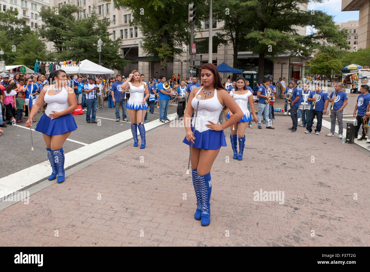 Salvadoran cheerleaders dancing with batons - USA Stock Photo