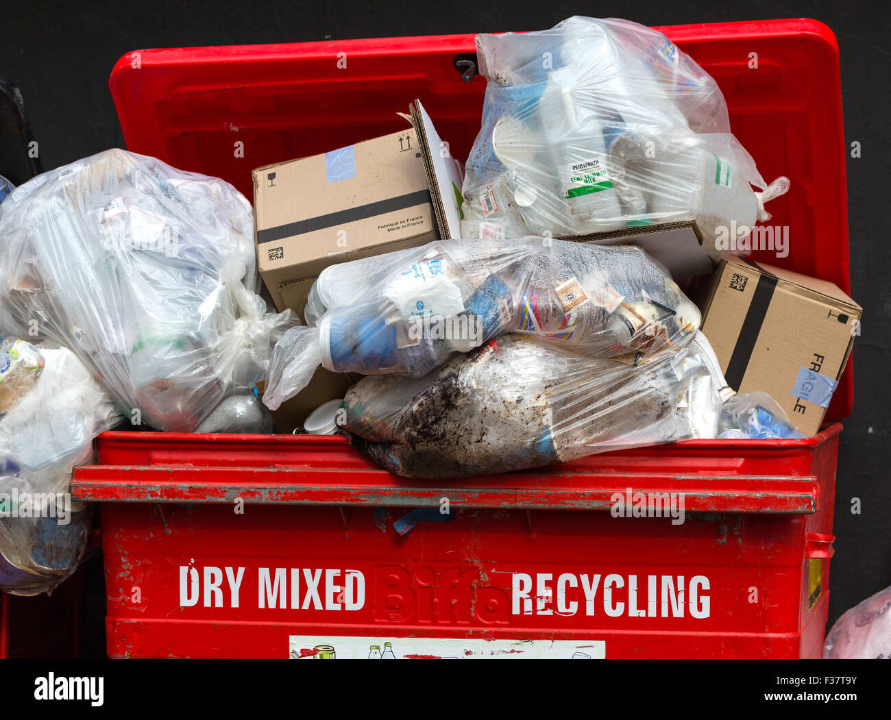 Rubbish piled high for collection. England UK Stock Photo Alamy
